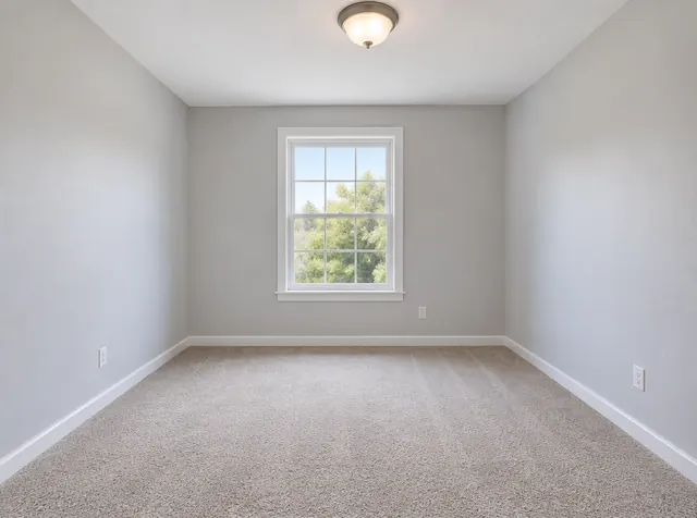 Before: Spare room staged as a home office